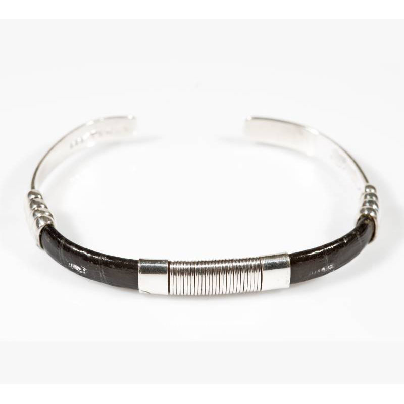 Bracciale rigido in argento e pelle